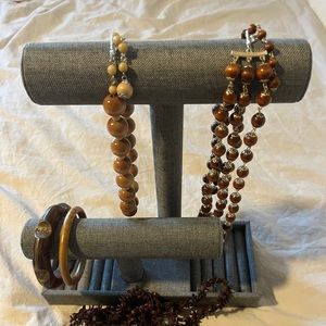 2 wooden signed Japan necklaces, 1 seed necklace and 2 wooden bangles.